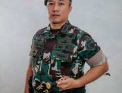 HUT TNI ke- 79 Komandan Batalyon Infantri (Danyonif) 900/SBW Letkol Inf Yudhison Rianta Tarigan, S.Sos., M.M.D.S Membagikan Bantuan Sosial kepada Masyarakat Bali